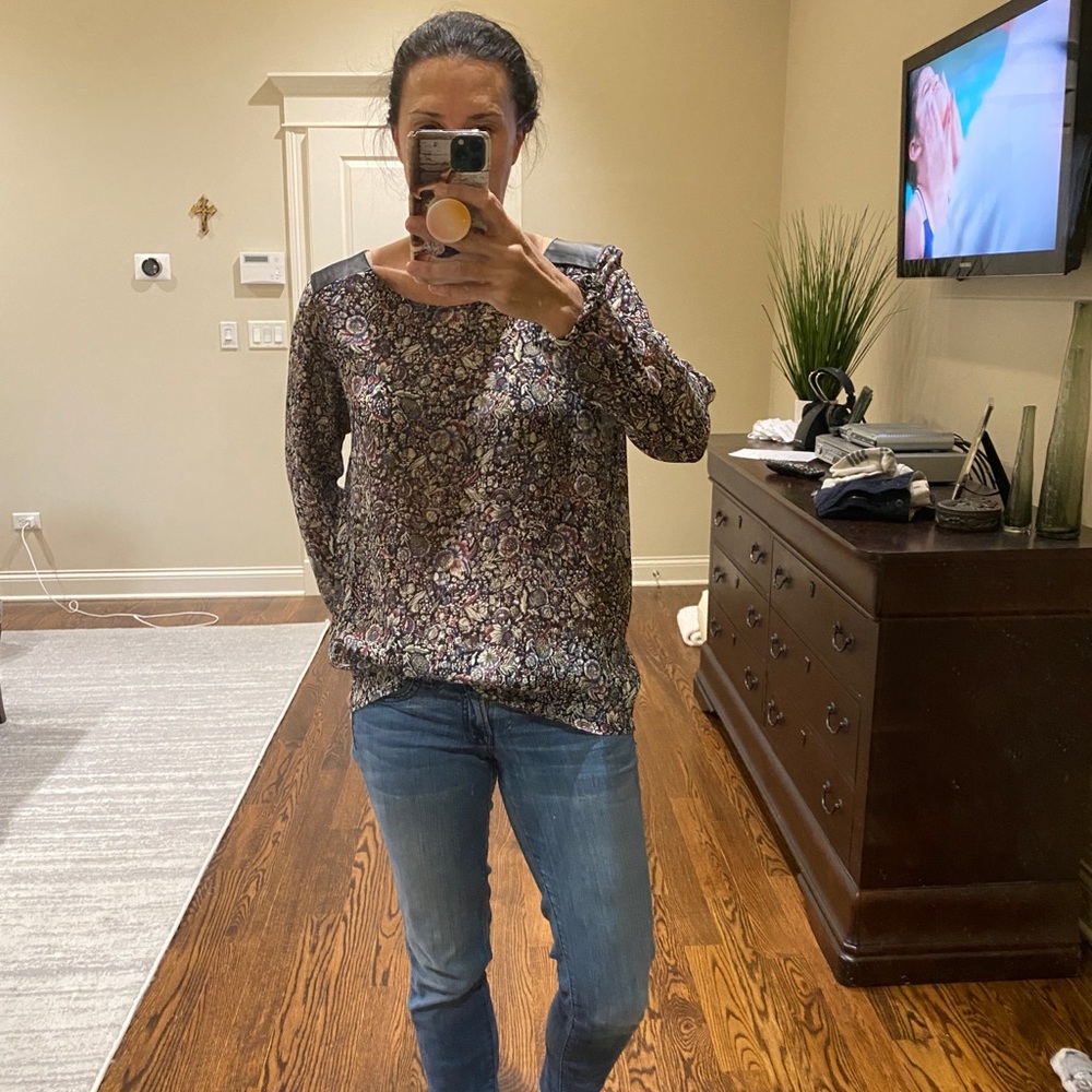 Club Monaco silk floral blouse with lamb leather shoulder patches.